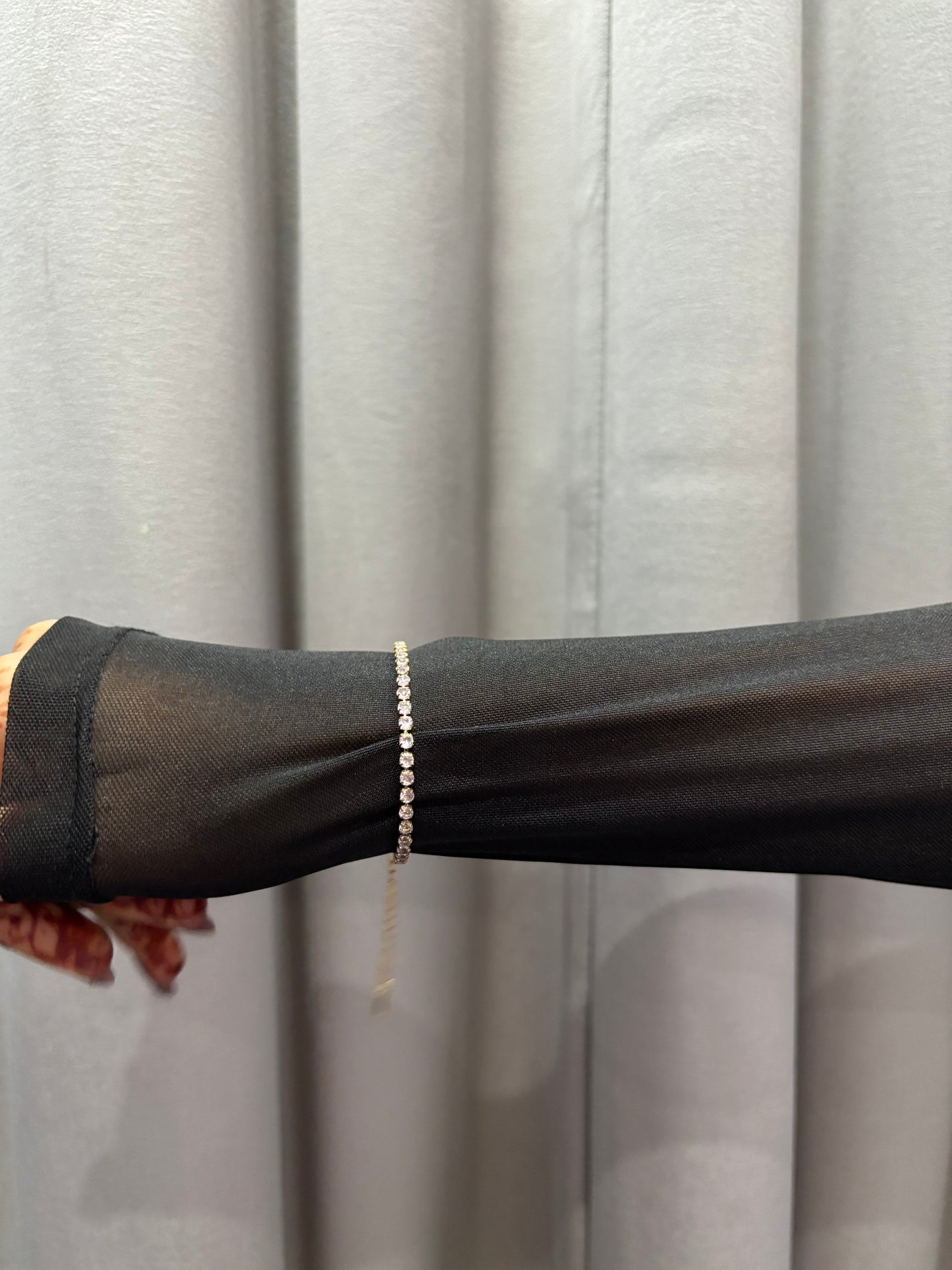 pink tennis bracelet